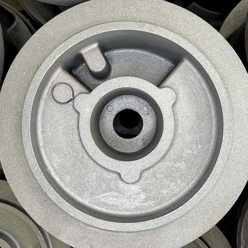 Coated sand shell casting